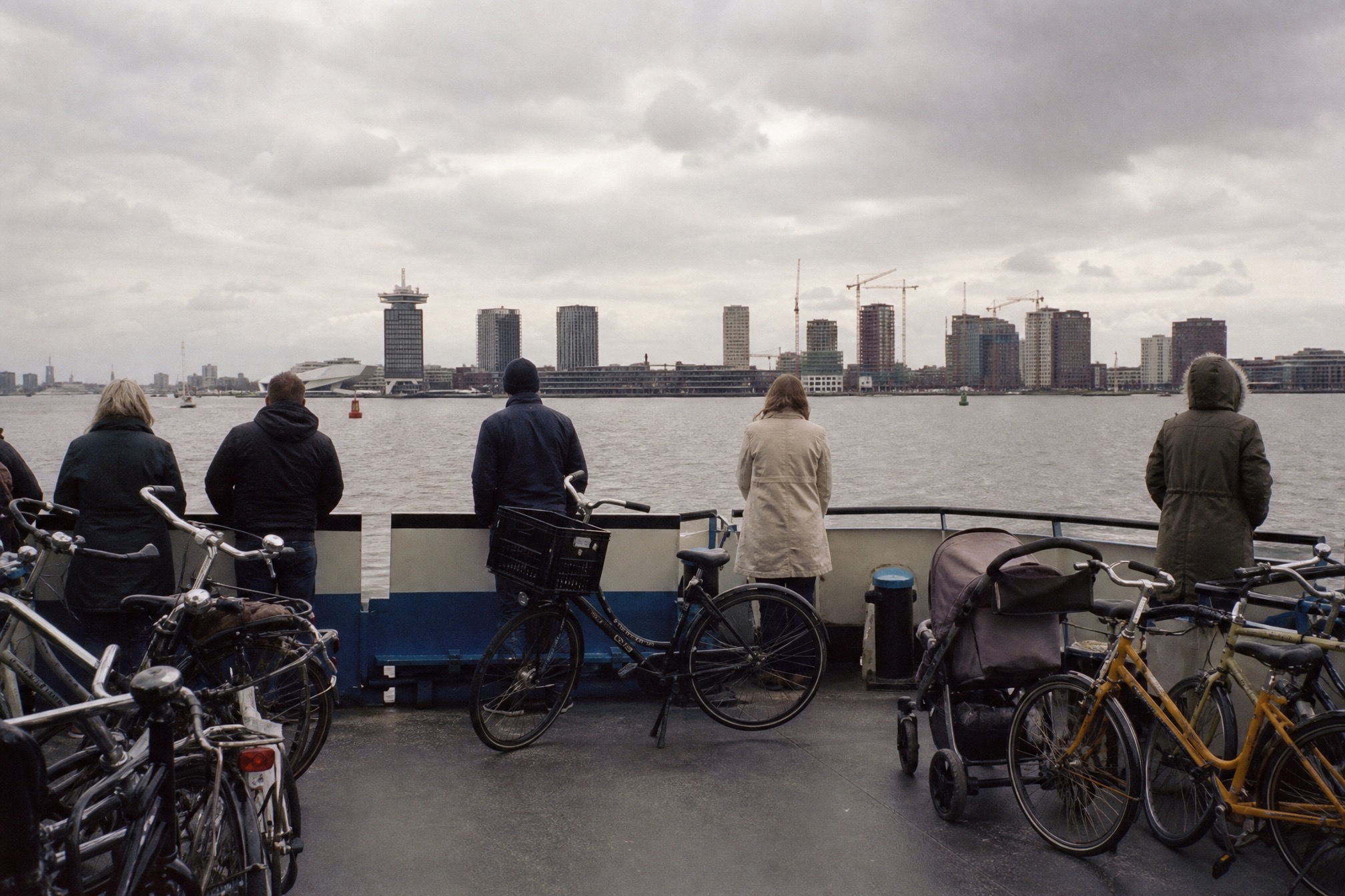 Passengers and bikes on the free ferry across the IJ in Amsterdam